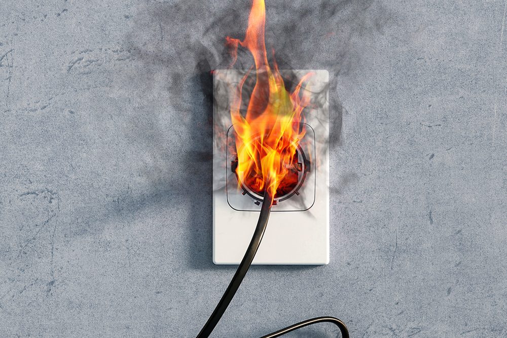 Forensic engineer examining a failed household appliance