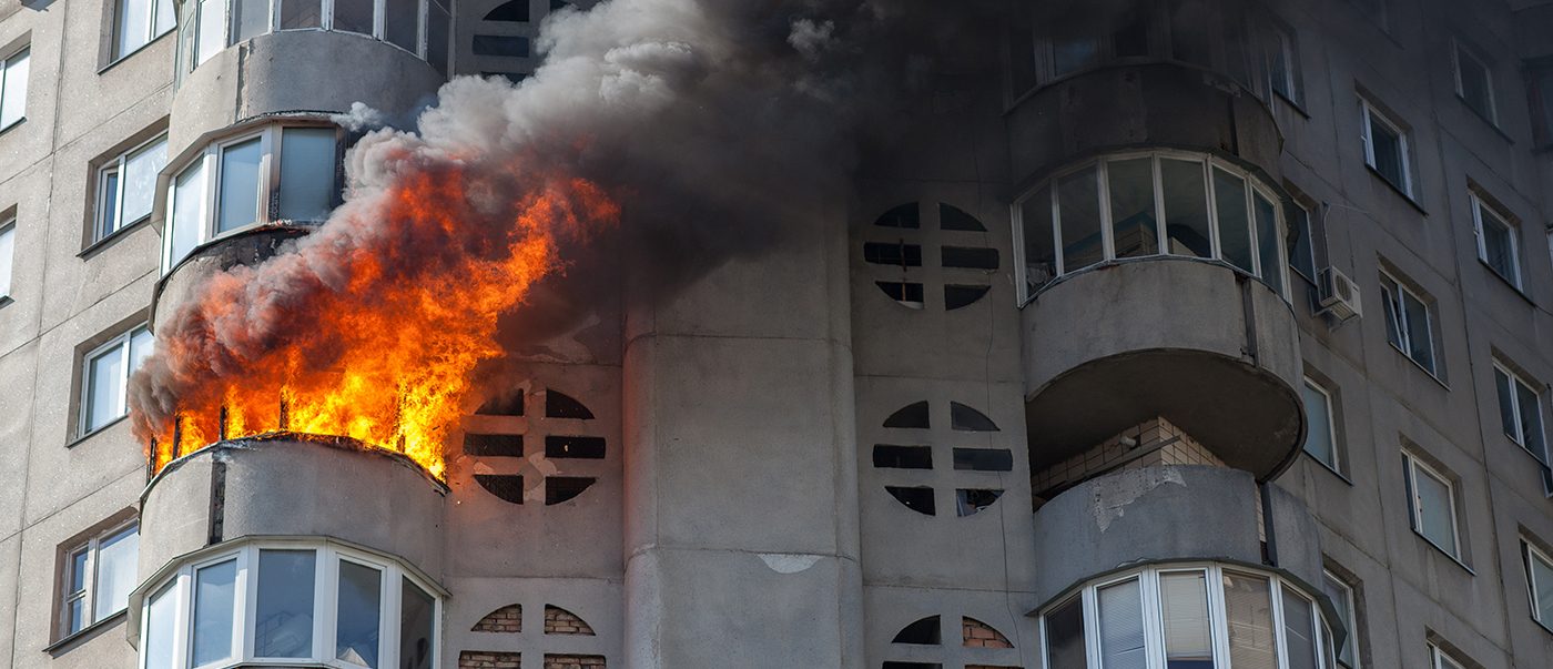 ESI investigator at a commercial building fire scene