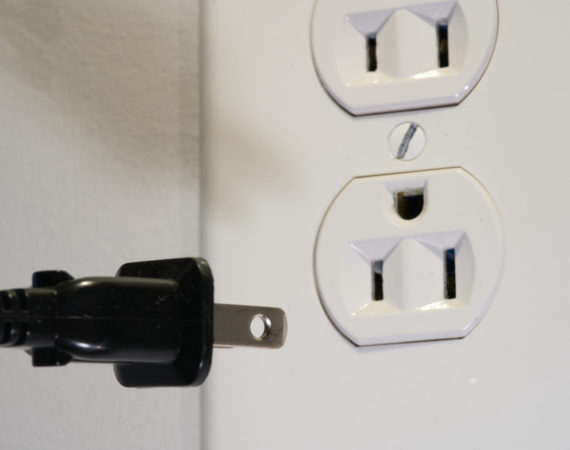 Why are electrical outlets sometimes “upside down?”
